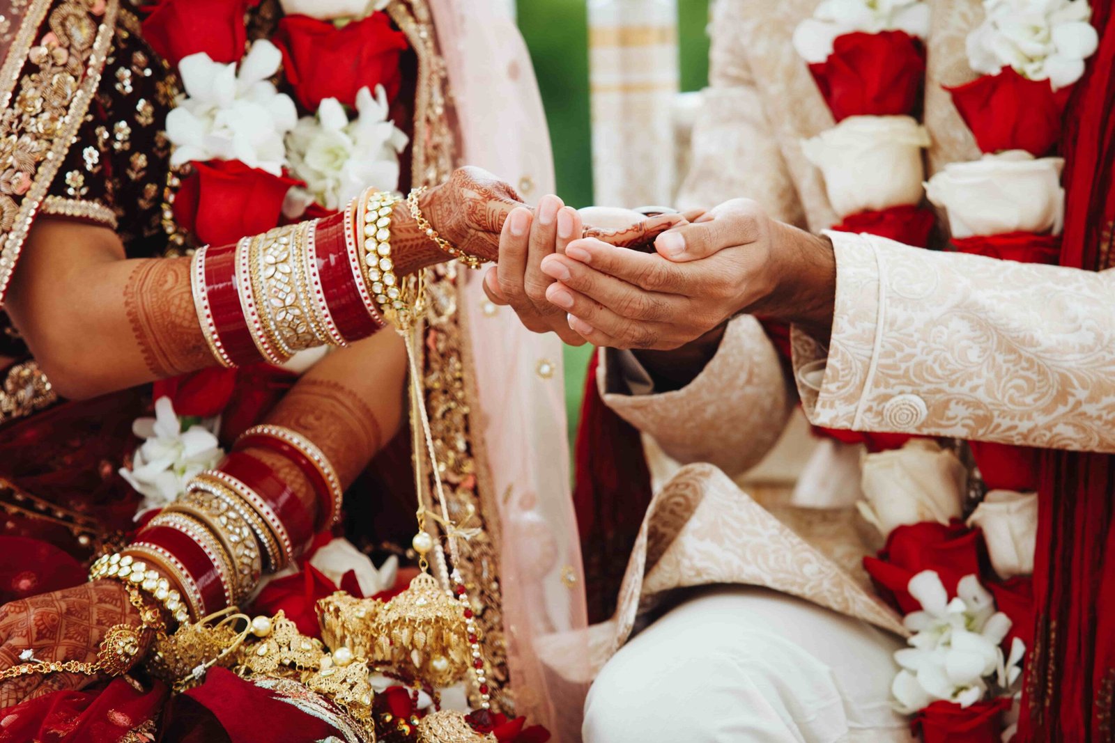 hands-indian-bride-groom-intertwined-together-making-authentic-wedding-ritual (1)